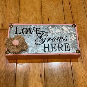 Love grows here sign